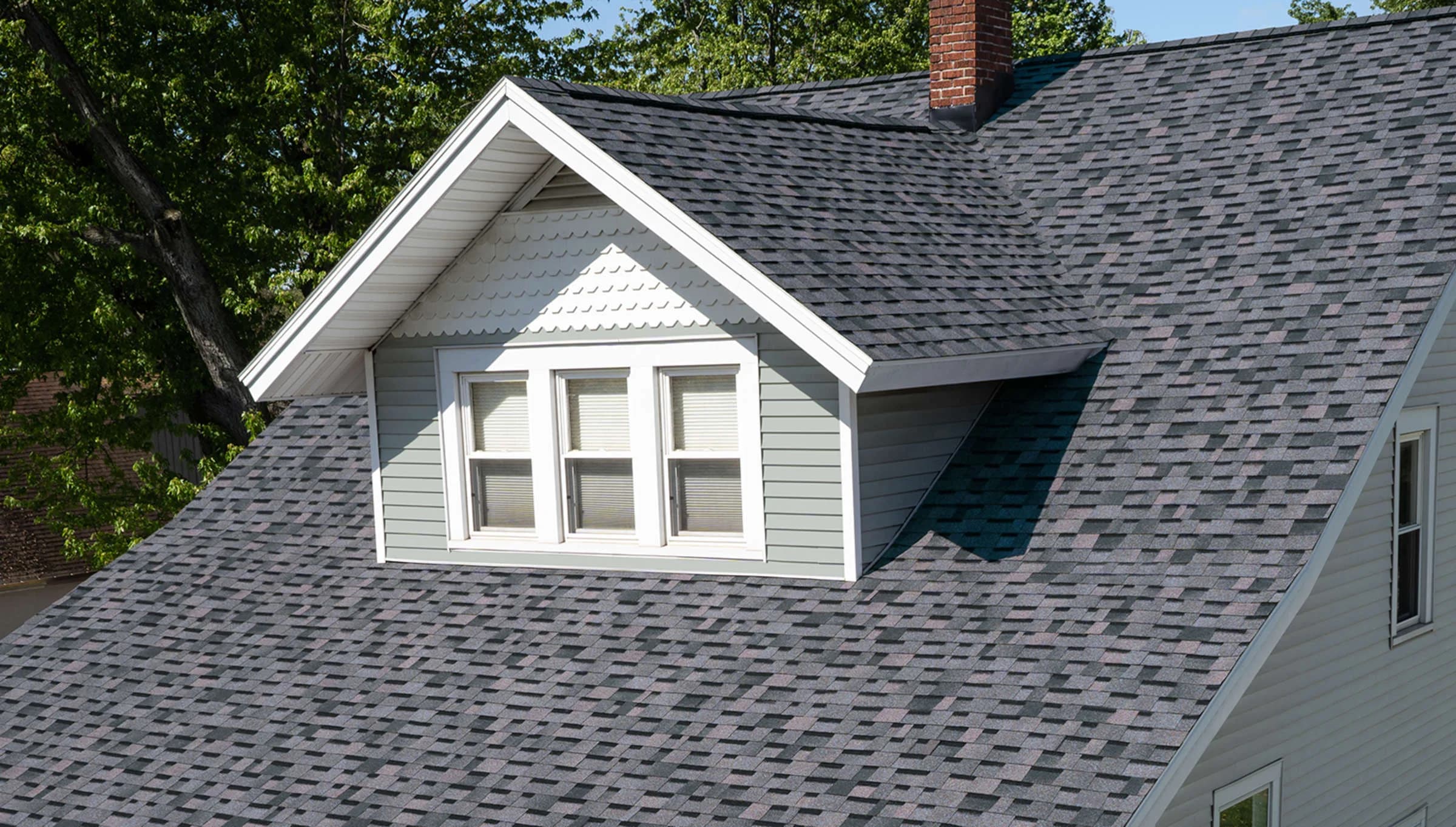Roof replacement in progress with new architectural shingles